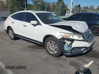 2013 Honda Crosstour EX-L z VIN 5J6TF3H52DL000383, wystawiony jako IAAI lot #40821590 z przebiegiem 169 445 mil mil oraz . Historia ofert i sprzedaży dostępna na DreamBid. Obrazek 1.