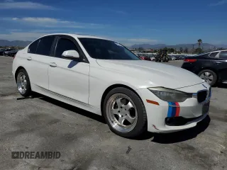 2014 BMW 3 Series 328i with VIN WBA3C1C56EK108374, listed as a Copart auction lot 52902485 with 136,407 mi miles and Salvage Title. Bid and sale history available at carsss.com. Image 4.
