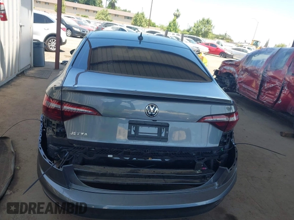2021 Volkswagen Jetta SEL z VIN 3VWE57BU3MM032442, wystawiony jako IAAI lot #42404802 z przebiegiem 32 927 mil mil oraz . Historia ofert i sprzedaży dostępna na DreamBid. Obrazek 17.
