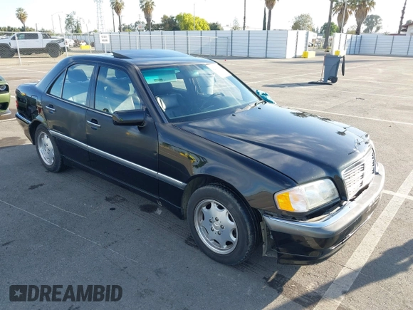 2000 Mercedes-Benz C 230 Kompressor z VIN WDBHA24G4YA799207, wystawiony jako IAAI lot #42010800 z przebiegiem 126 478 mil mil oraz . Historia ofert i sprzedaży dostępna na DreamBid. Obrazek 1.