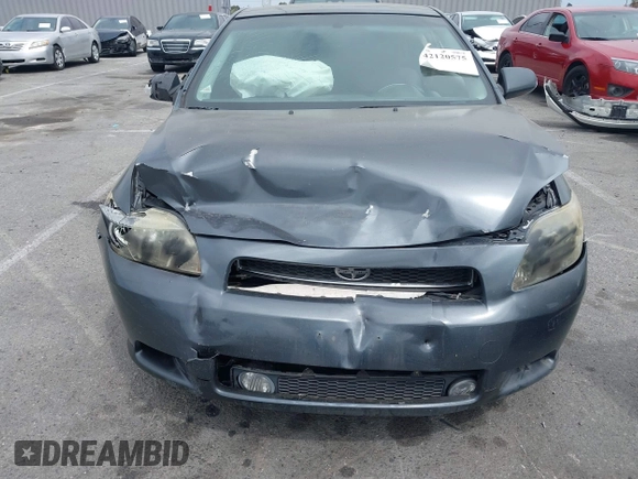 2005 Scion tC with VIN JTKDE177950042663, listed as a IAAI auction lot 42120575 with 255,225 mi miles. Bid and sale history available at carsss.com. Image 6.