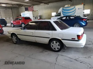 1991 Toyota Camry z VIN 4T1VV21E8MU050409, wystawiony jako Copart lot #61379824 z przebiegiem 100 949 mil mil oraz Nie do naprawy • Non repairable. Historia ofert i sprzedaży dostępna na DreamBid. Obrazek 2.