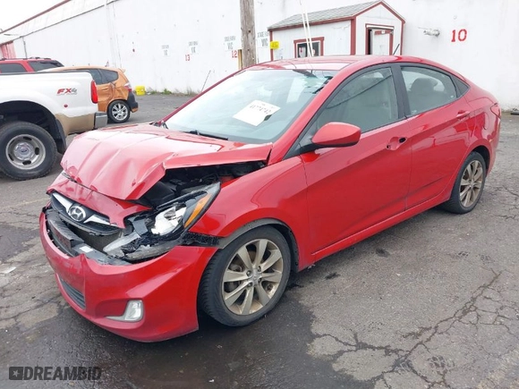 2012 Hyundai Accent GLS with VIN KMHCU4AE7CU132765, listed as a IAAI auction lot 41774742 with 120,294 mi miles. Bid and sale history available at carsss.com. Image 2.
