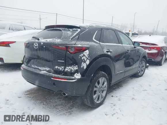 2023 Mazda CX-30 S Preferred z VIN 3MVDMBCM5PM538960, wystawiony jako IAAI lot #41273300 z przebiegiem 22 846 mil mil oraz . Historia ofert i sprzedaży dostępna na DreamBid. Obrazek 4.