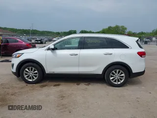 2017 Kia Sorento LX with VIN 5XYPGDA57HG216333, listed as a IAAI auction lot 42524652 with 214,700 mi miles and . Bid and sale history available at DreamBid. Image 14.