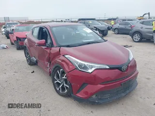 2018 Toyota C-HR XLE z VIN NMTKHMBX9JR004502, wystawiony jako IAAI lot #41914587 z przebiegiem 82 086 mil mil oraz . Historia ofert i sprzedaży dostępna na DreamBid. Obrazek 1.