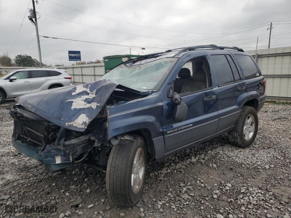 2002 Jeep Grand Cherokee Laredo with VIN 1J4GW48N02C165868, listed as a Copart auction lot 82228494 with 0 mi miles and Salvage Title. Bid and sale history available at carsss.com. Image 1.