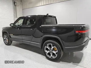 2022 Rivian R1T Adventure z VIN 7FCTGAAA5NN007486, wystawiony jako Copart lot #52649075 z przebiegiem 23 292 mil mil oraz Czysty tytuł • Clean title. Historia ofert i sprzedaży dostępna na DreamBid. Obrazek 2.