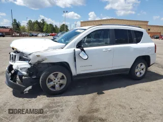 2014 Jeep Compass Sport with VIN 1C4NJCBA5ED844934, listed as a Copart auction lot 52774945 with 148,897 mi miles and Salvage Title. Bid and sale history available at carsss.com. Image 1.