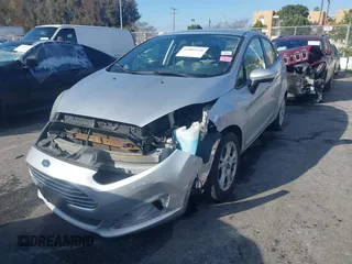 2016 Ford Fiesta SE with VIN 3FADP4BJ6GM205412, listed as a IAAI auction lot 41809126 with 100,941 mi miles. Bid and sale history available at carsss.com. Image 2.