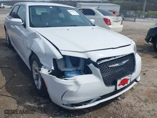 2016 Chrysler 300 Limited with VIN 2C3CCAAG7GH197829, listed as a IAAI auction lot 41853341 with 220,662 mi miles. Bid and sale history available at carsss.com. Image 6.