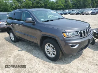 2020 Jeep Grand Cherokee Laredo E with VIN 1C4RJFAGXLC143334, listed as a Copart auction lot 60437345 with 62,484 mi miles and Salvage title. Bid and sale history available at DreamBid. Image 4.