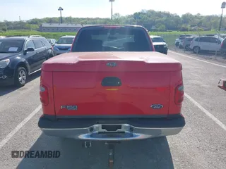 2003 Ford F-150 XLT with VIN 1FTRW08L43KD14456, listed as a IAAI auction lot 42098830 with 234,908 mi miles. Bid and sale history available at carsss.com. Image 17.