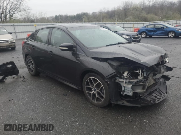 2015 Ford Focus SE with VIN 1FADP3F24FL251916, listed as a Copart auction lot 52800145 with 131,862 mi miles and Salvage Title. Bid and sale history available at DreamBid. Image 4.