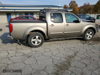2005 Nissan Frontier 4WD LE with VIN 1N6AD07W65C436812, listed as a Copart auction lot 77156274 with 173,903 mi miles and Salvage Title. Bid and sale history available at carsss.com. Image 3.