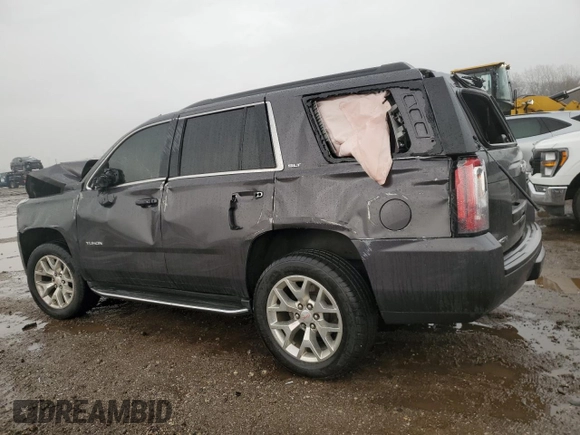 2015 GMC Yukon SLT with VIN 1GKS2BKC1FR732961, listed as a Copart auction lot 49898945 with 0 mi miles and Salvage Title. Bid and sale history available at carsss.com. Image 2.