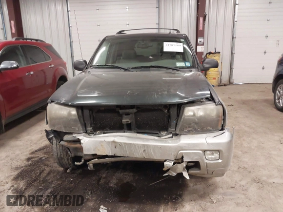 2006 Chevrolet TrailBlazer LS with VIN 1GNDT13SX62107279, listed as a IAAI auction lot 41707289 with 113,665 mi miles and . Bid and sale history available at DreamBid. Image 12.