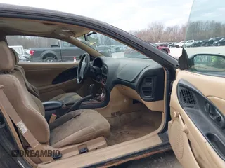 1997 Chrysler Sebring z VIN 4C3AU42Y3VE094925, wystawiony jako IAAI lot #41879285 z przebiegiem 177 602 mil mil oraz . Historia ofert i sprzedaży dostępna na DreamBid. Obrazek 5.