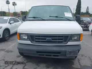 2005 Ford Econoline Cargo with VIN 1FTRE14W95HA47937, listed as a IAAI auction lot 41922991 with 175,138 mi miles. Bid and sale history available at carsss.com. Image 12.