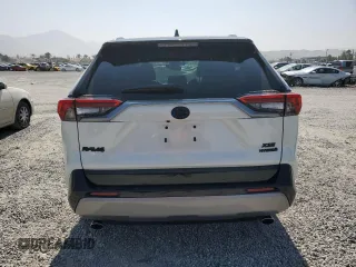 2022 Toyota RAV4 Hybrid XSE с VIN 4T3E6RFV6NU086056, выставлен на аукционе Copart как лот 60143275 с пробегом 37 948 миль миль и Списание • Salvage title. История ставок и продаж доступна на DreamBid. Изображение 6.