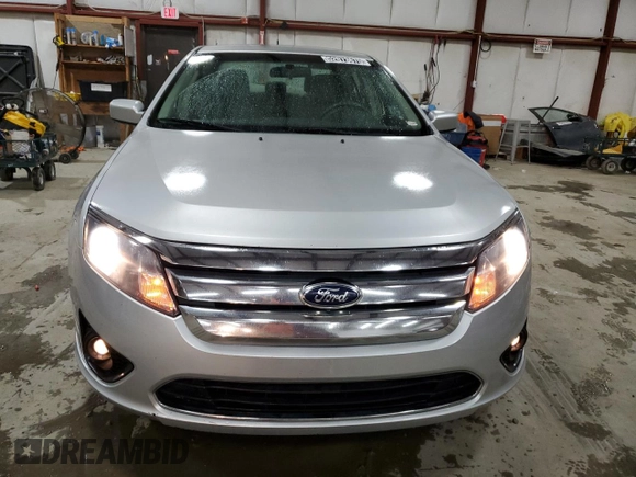 2012 Ford Fusion SE z VIN 3FAHP0HA5CR371175, wystawiony jako Copart lot #52073675 z przebiegiem 135 813 mil mil oraz Czysty tytuł • Clean title. Historia ofert i sprzedaży dostępna na DreamBid. Obrazek 5.