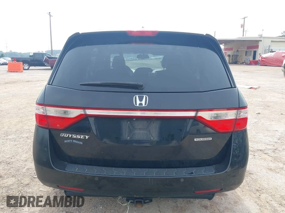 2011 Honda Odyssey Touring with VIN 5FNRL5H90BB070472, listed as a IAAI auction lot 42367710 with 203,589 mi miles and . Bid and sale history available at DreamBid. Image 16.