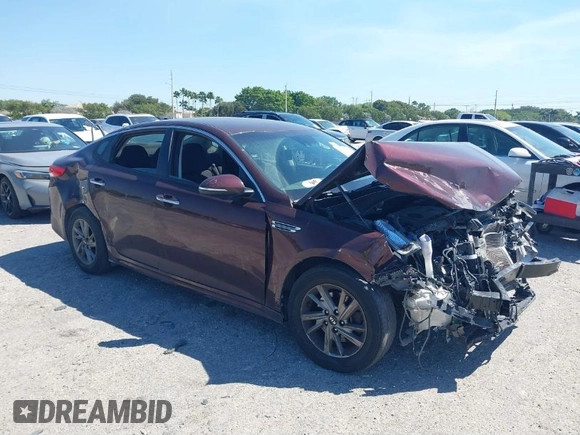 2019 Kia Optima LX with VIN 5XXGT4L34KG323567, listed as a IAAI auction lot 41770143 with 67,910 mi miles. Bid and sale history available at carsss.com. Image 1.