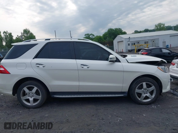 2014 Mercedes-Benz M 550 with VIN 4JGDA7DBXEA328591, listed as a IAAI auction lot 42487544 with 122,136 mi miles and . Bid and sale history available at DreamBid. Image 13.