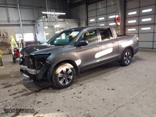 2019 Honda Ridgeline RTL with VIN 5FPYK2F54KB005791, listed as a IAAI auction lot 41285980 with 49,729 mi miles. Bid and sale history available at carsss.com. Image 2.