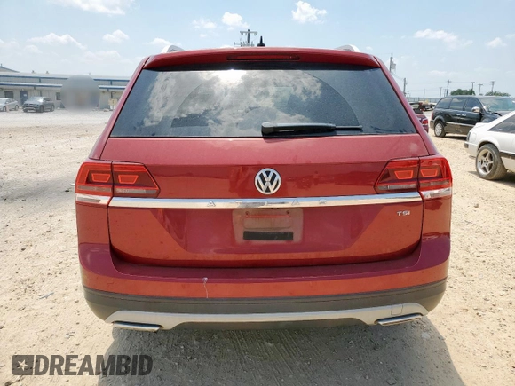 2018 Volkswagen Atlas S with VIN 1V2AP2CA9JC599351, listed as a Copart auction lot 58223485 with 69,527 mi miles and Salvage title. Bid and sale history available at DreamBid. Image 6.