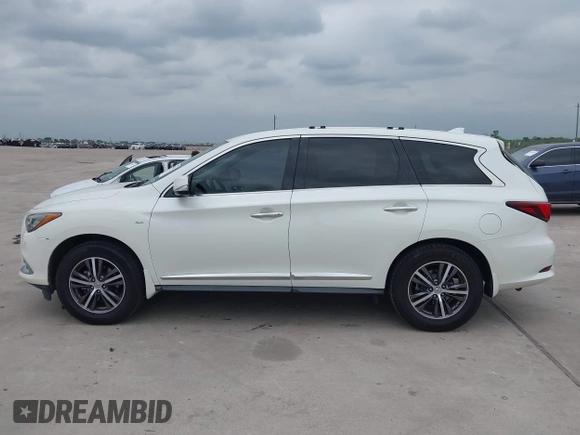 2016 Infiniti QX60 with VIN 5N1AL0MNXGC532149, listed as a IAAI auction lot 42034650 with 124,126 mi miles and . Bid and sale history available at DreamBid. Image 14.