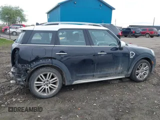 2019 MINI Countryman Cooper S z VIN WMZYT5C5XK3E69664, wystawiony jako IAAI lot #42385669 z przebiegiem 64 761 mil mil oraz . Historia ofert i sprzedaży dostępna na DreamBid. Obrazek 14.