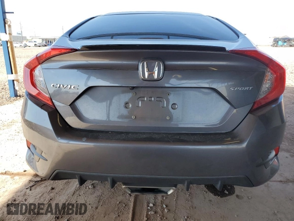2021 Honda Civic Sport with VIN 19XFC2F80ME003634, listed as a Copart auction lot 52317715 with 69,411 mi miles and Salvage Title. Bid and sale history available at DreamBid. Image 6.