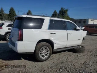 2015 GMC Yukon SLE with VIN 1GKS2AKCXFR107517, listed as a Copart auction lot 76950354 with Not Provided miles and Salvage Title. Bid and sale history available at carsss.com. Image 3.