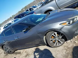 2018 Nissan Maxima SL z VIN 1N4AA6AP2JC387155, wystawiony jako IAAI lot #41642025 z przebiegiem 125 621 mil mil oraz . Historia ofert i sprzedaży dostępna na DreamBid. Obrazek 13.