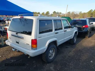 2000 Jeep Cherokee Limited with VIN 1J4FF68S3YL112376, listed as a IAAI auction lot 41946899 with 208,228 mi miles. Bid and sale history available at carsss.com. Image 4.