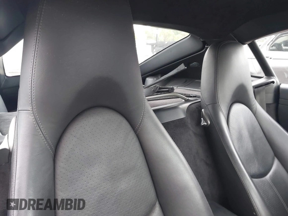 2007 Porsche Cayman S with VIN WP0AB29877U780410, listed as a IAAI auction lot 42153981 with 74,366 mi miles and . Bid and sale history available at DreamBid. Image 8.
