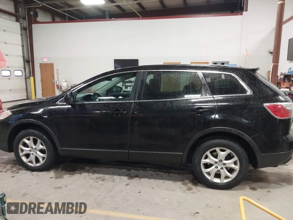 2011 Mazda CX-9 Sport with VIN JM3TB3BV9B0313270, listed as a IAAI auction lot 41474571 with 149,302 mi miles and . Bid and sale history available at DreamBid. Image 14.