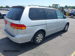 2003 Honda Odyssey EX-L with VIN 5FNRL18993B098670, listed as a IAAI auction lot 42781006 with 222,584 mi miles and . Bid and sale history available at DreamBid. Image 4.