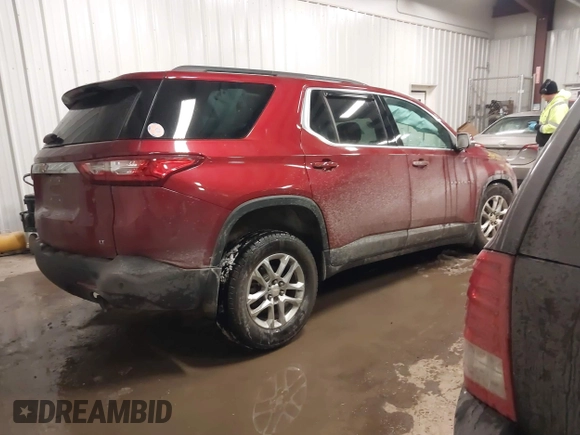 2021 Chevrolet Traverse LT Cloth with VIN 1GNEVGKW8MJ124350, listed as a IAAI auction lot 41456704 with 121,336 mi miles. Bid and sale history available at carsss.com. Image 4.