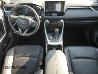 2020 Toyota RAV4 Hybrid Limited z VIN 4T3DWRFV0LU004797, wystawiony jako Copart lot #54181595 z przebiegiem 63 055 mil mil oraz Szkoda całkowita • Salvage title. Historia ofert i sprzedaży dostępna na DreamBid. Obrazek 8.
