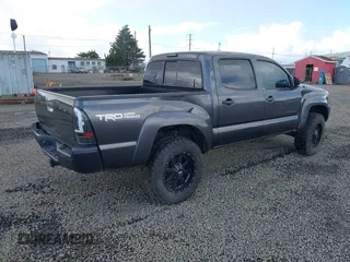 2013 Toyota Tacoma with VIN 3TMLU4ENXDM105967, listed as a IAAI auction lot 41819211 with 121,012 mi miles and . Bid and sale history available at DreamBid. Image 4.