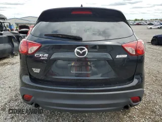2014 Mazda CX-5 Grand Touring with VIN JM3KE4DY3E0304908, listed as a Copart auction lot 53873655 with 144,382 mi miles and Salvage Title. Bid and sale history available at DreamBid. Image 6.