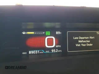 2017 Toyota Prius Plus z VIN JTDKARFP9H3028985, wystawiony jako Copart lot #57596735 z przebiegiem 89 031 mil mil oraz Szkody całkowita. Historia ofert i sprzedaży dostępna na DreamBid. Obrazek 9.