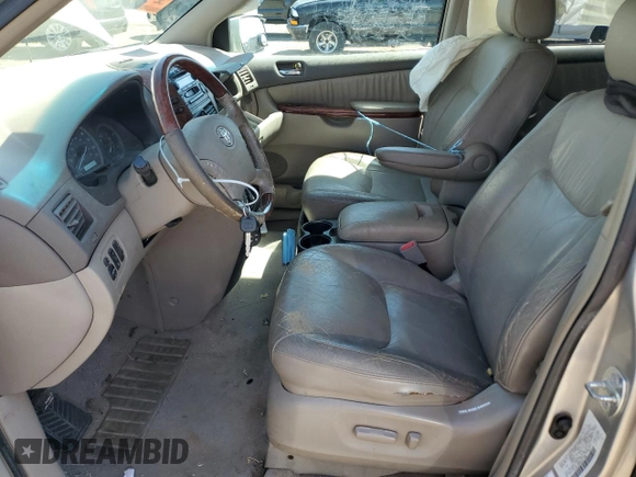 2004 Toyota Sienna XLE z VIN 5TDZA22C04S211936, wystawiony jako Copart lot #52076445 z przebiegiem 142 940 mil mil oraz Szkoda całkowita • Salvage title. Historia ofert i sprzedaży dostępna na DreamBid. Obrazek 7.