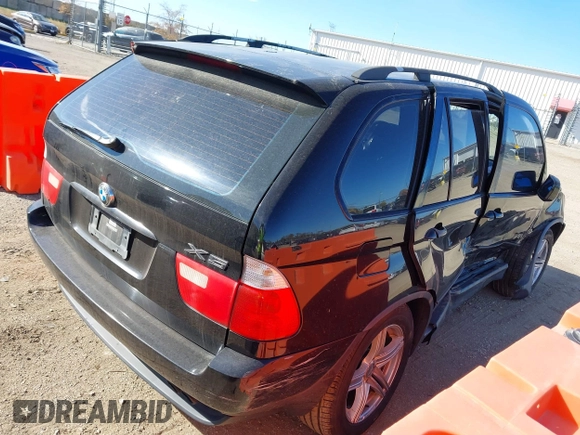 2001 BMW X5 4.4i with VIN WBAFB33581LH08039, listed as a IAAI auction lot 40679627 with 1 mi miles. Bid and sale history available at carsss.com. Image 4.
