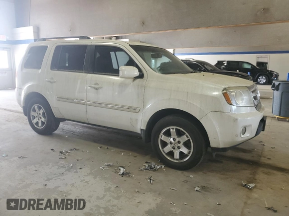 2011 Honda Pilot Touring z VIN 5FNYF3H91BB035074, wystawiony jako Copart lot #54789885 z przebiegiem 196 234 mil mil oraz Czysty tytuł • Clean title. Historia ofert i sprzedaży dostępna na DreamBid. Obrazek 4.