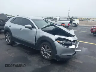 2021 Mazda CX-30 Select with VIN 3MVDMBBLXMM246600, listed as a IAAI auction lot 42418629 with 77,713 mi miles and . Bid and sale history available at DreamBid. Image 1.