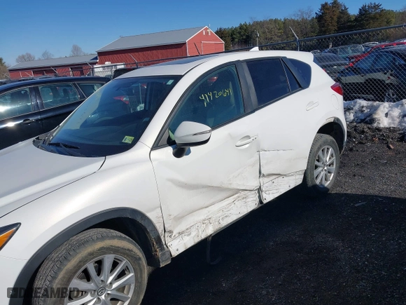 2016 Mazda CX-5 Touring with VIN JM3KE4CYXG0917841, listed as a IAAI auction lot 41420641 with 75,710 mi miles. Bid and sale history available at carsss.com. Image 6.