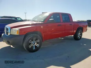 2006 Dodge Dakota ST z VIN 1D7HW28N96S508578, wystawiony jako Copart lot #57803735 z przebiegiem 107 359 mil mil oraz Czysty tytuł • Clean title. Historia ofert i sprzedaży dostępna na DreamBid. Obrazek 1.